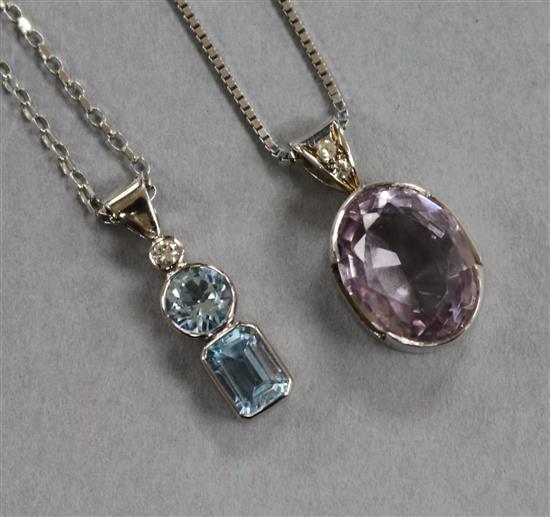 A 9ct white gold, diamond and aquamarine three-stone pendant on chain and a similar pale amethyst pendant on chain.